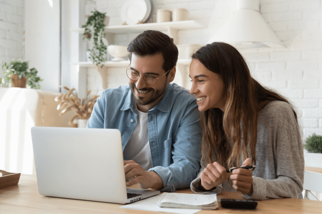 Couple managing their finances through online banking