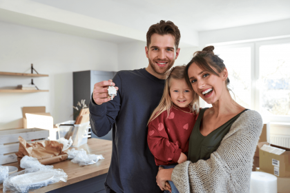 Happy family with new home keys