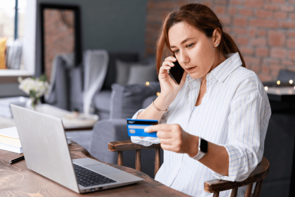 Woman contacting bank for card renewal over the phone