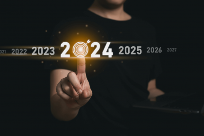 Woman pointing to 2024 on a timeline