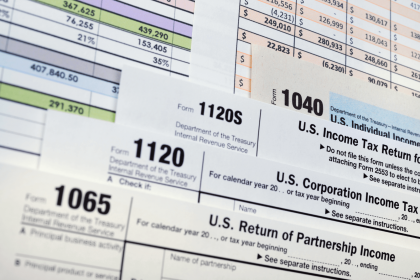 U.S. Income Tax Return forms including 1040, 1120, and 1065