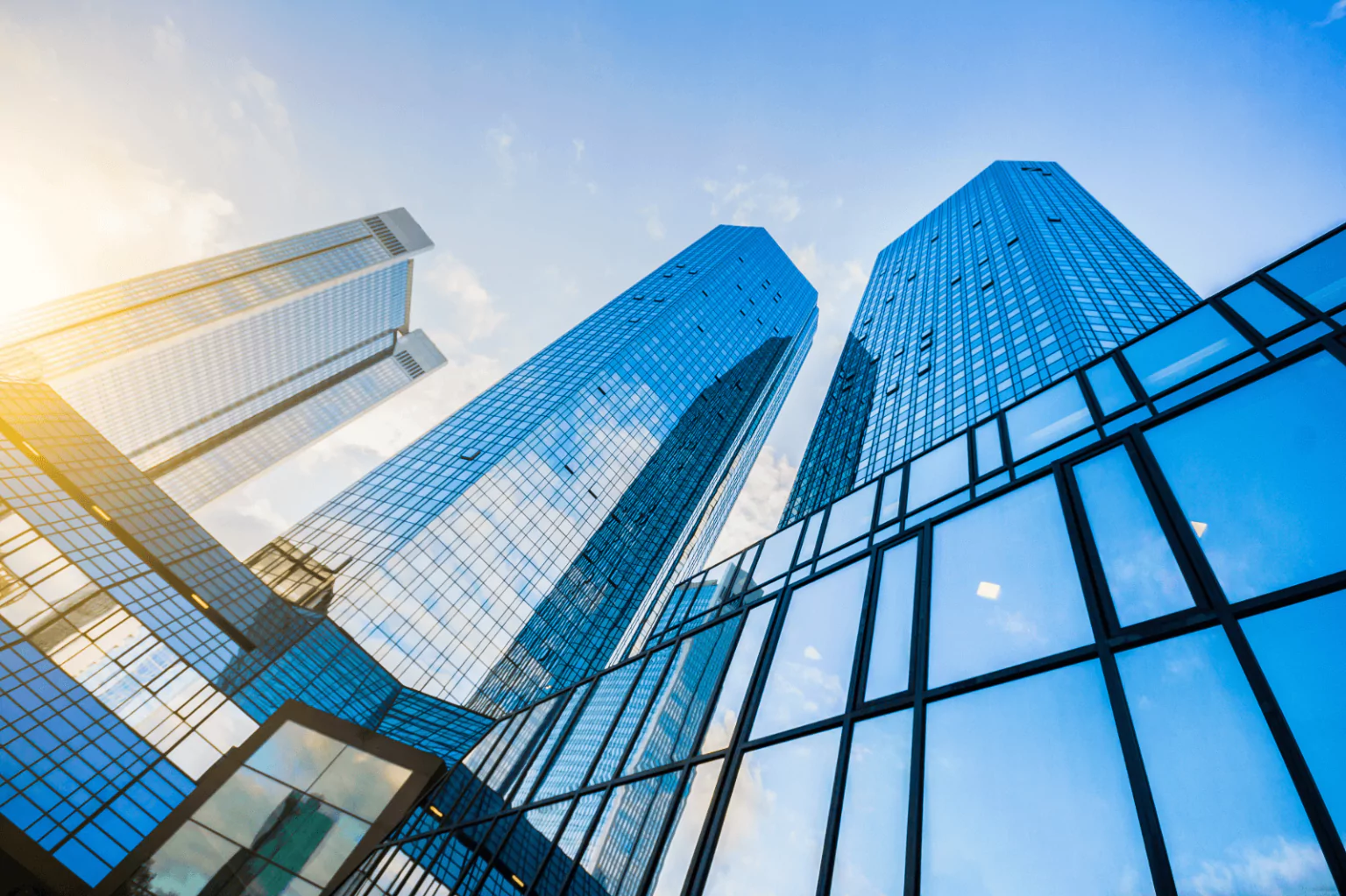 Modern skyscrapers representing top real estate investments for 2024.