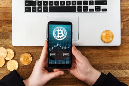 Person using a smartphone to trade Bitcoin