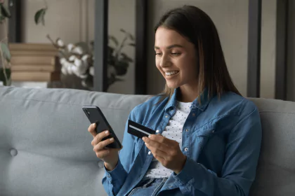 Woman checking her Bank of America card balance on a smartphone