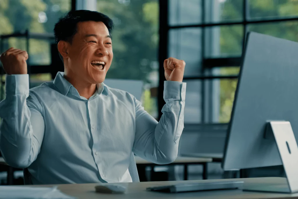 Happy investor reacting to stock market gains