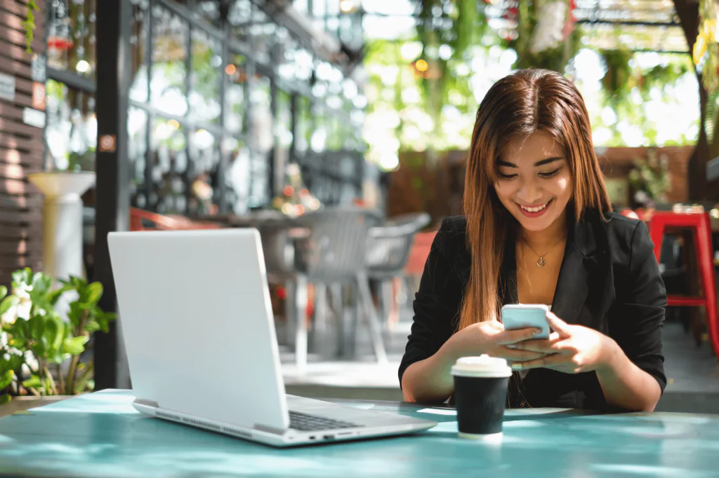 Woman using a smartphone for online banking